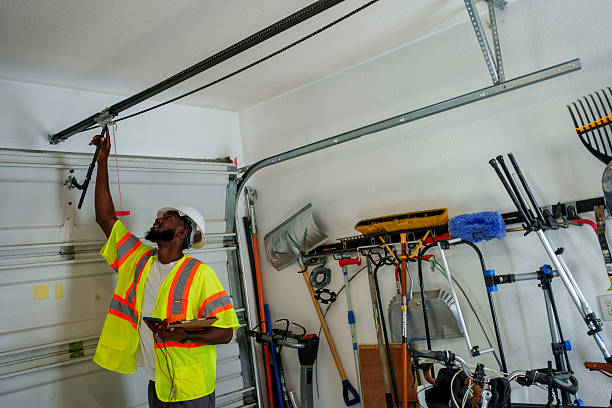 Professional Garage Door Panel Replacement technician working in Westmere, NY